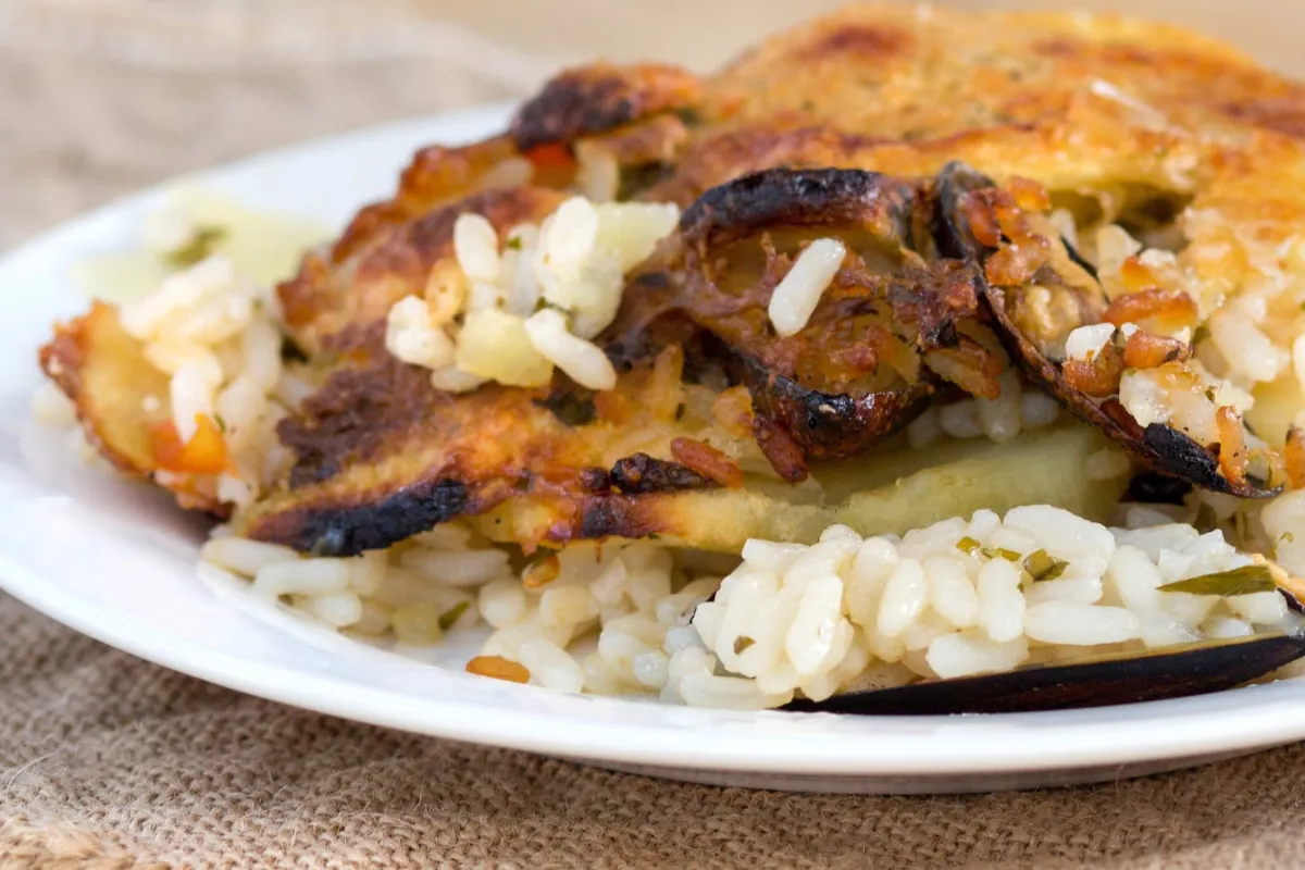 Ricetta Riso Patate Cozze un piatto delizioso barese che il nostro chef ti spiega in 7 minuti di cottura